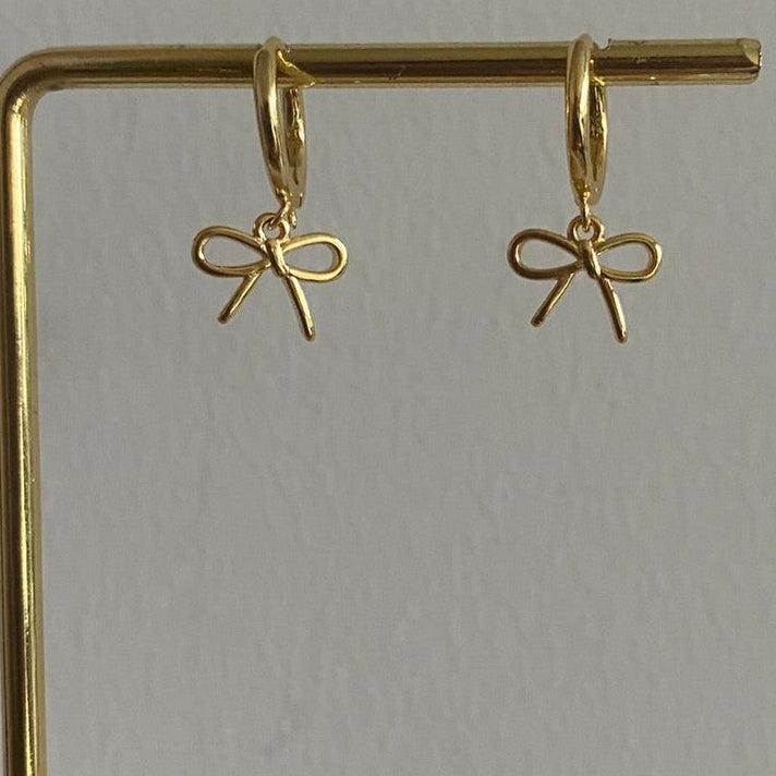 14K vergulde earparty oorringetjes met mini strikjes