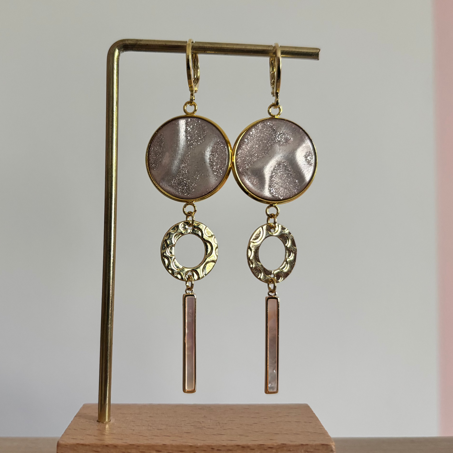roze disc, gouden cirkel, shell staafje