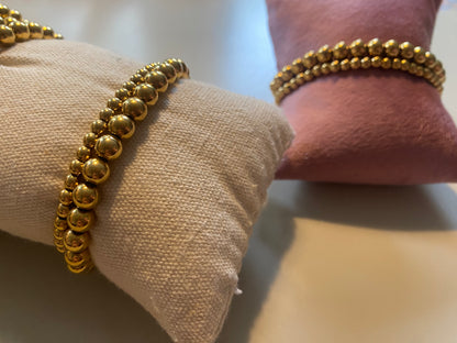 Waterdichte goldfilled RVS bolletjesarmbanden in 18k goudkleur, verkrijgbaar in 4 en 6 mm, dé sieradentrend van het moment.