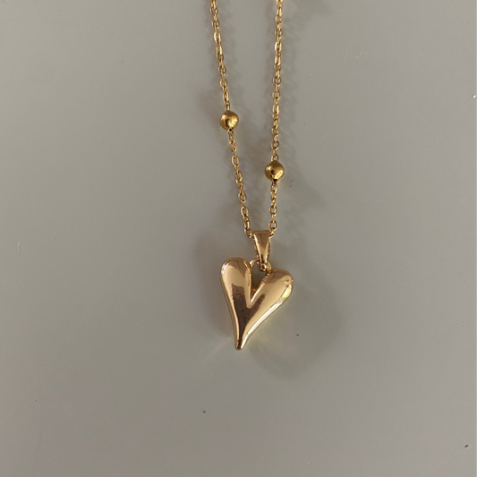 Basic bolletjesketting van 45 cm met verlengstuk, goldplated hartje en mogelijkheid om met bedels een persoonlijke look te creëren.