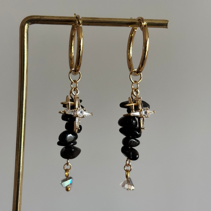 rvs ring, zirkonia vierpuntster, natuusteen strengetje zwart, eindbedel glas