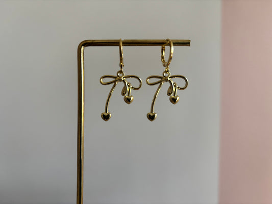 14k vergulde strikjes oorbellen, ca. 3 cm lang, speels en elegant ontwer